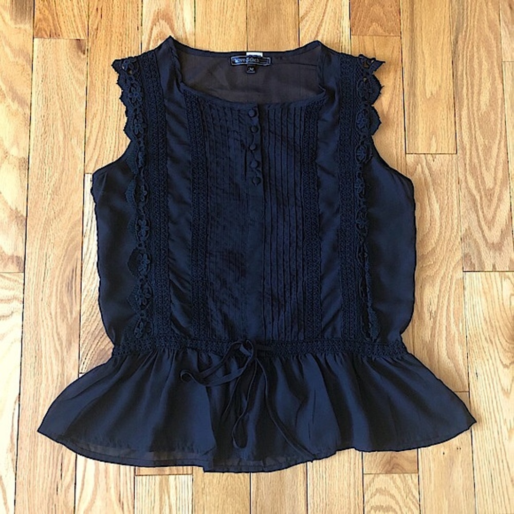 Love Stitch Peplum Blouse with Crochet and Pleat Details.